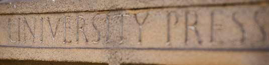 An image of an antique Cambridge University Press door