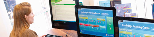 An image showing a young woman at a computer screen at the Cambridge University Press Learning Centre in Cambridge
