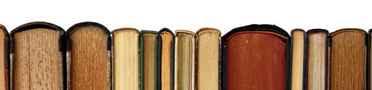 An image showing some antique books in a line