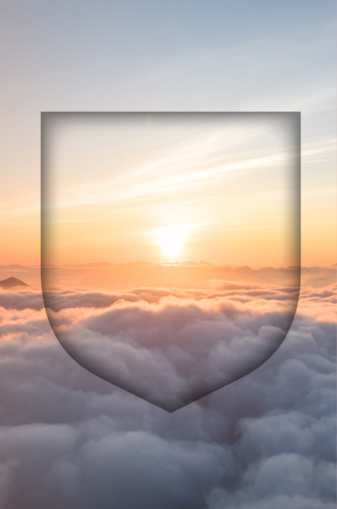 A serene image of a sunrise above a sea of clouds. The sun is partially visible on the horizon, casting a warm orange and yellow glow across the sky and clouds.