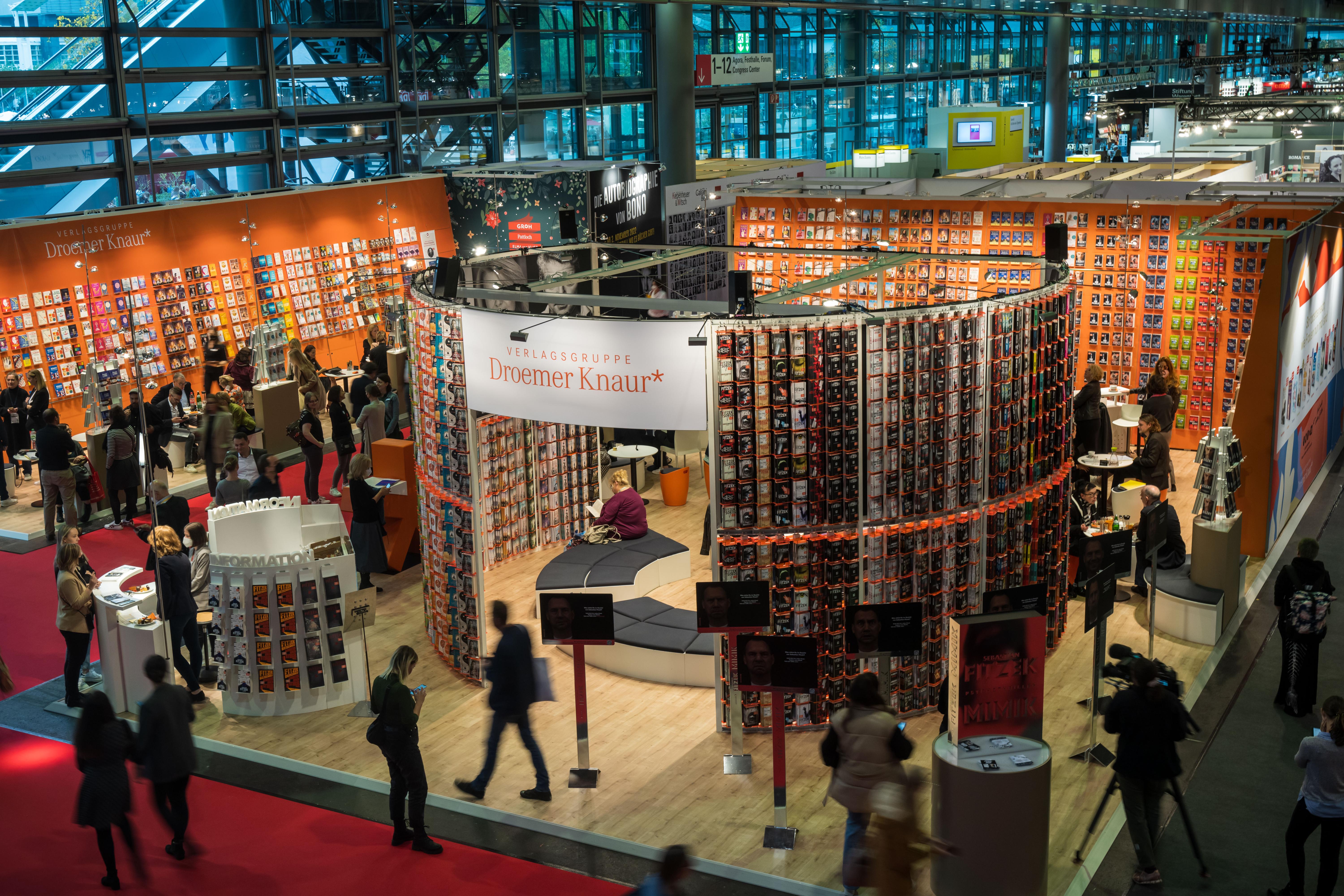 Exhibition stands at Frankfurt Book Fair 2022 packed with high walls of books 
