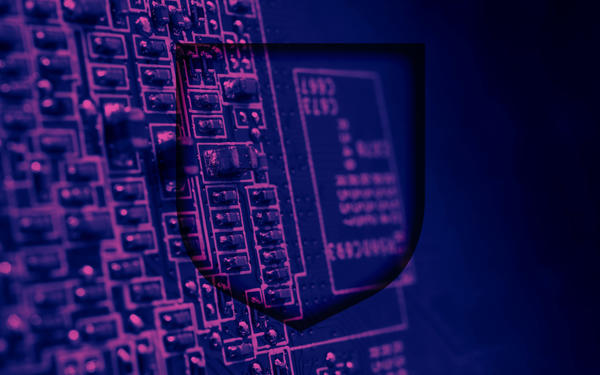 Image of motherboard with purple wash, featuring a central shield emblem