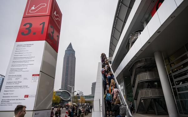 Delegates arriving outside of the Frankfurt Book Fair exhibition centre in 2022