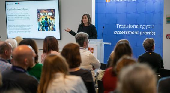 Woman presenting at conference