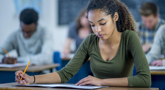 Students taking an exam in a classroom