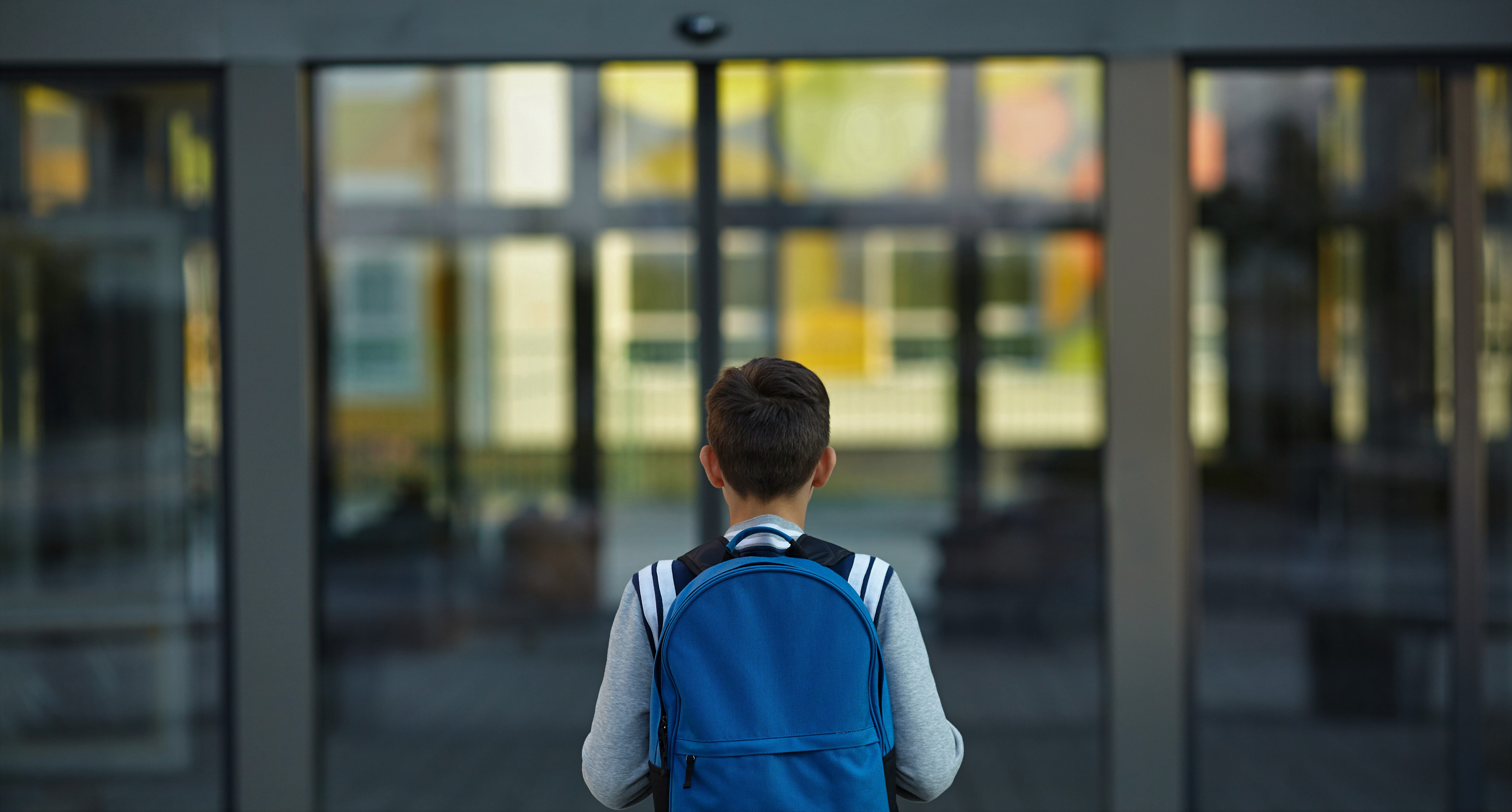 School boy with backpack